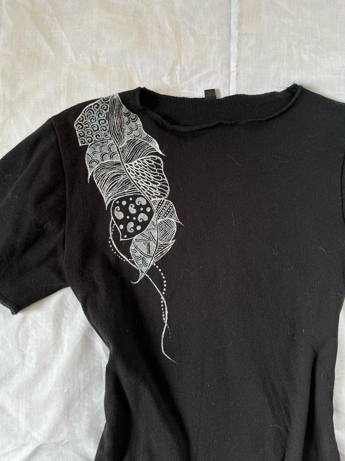 Black ribbed top with hand- painted mandala details. - Image 2